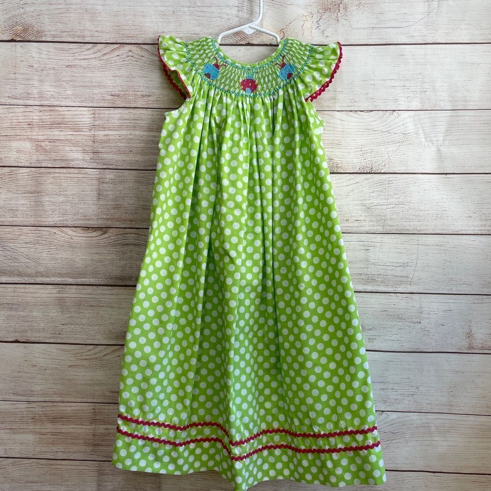 STITCHED AND SMOCKED GREEN AND‎ WHITE POLKA DOT DRESS WITH EMBROIDERED LADYBUGS